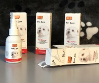 Oren hond schoonmaken